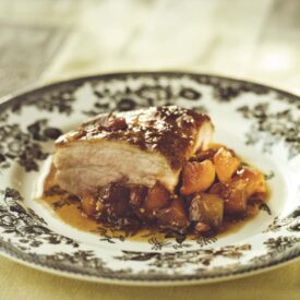 This maple and cider-glazed braised pork belly with spiced apple chutney recipe is perfect for fall