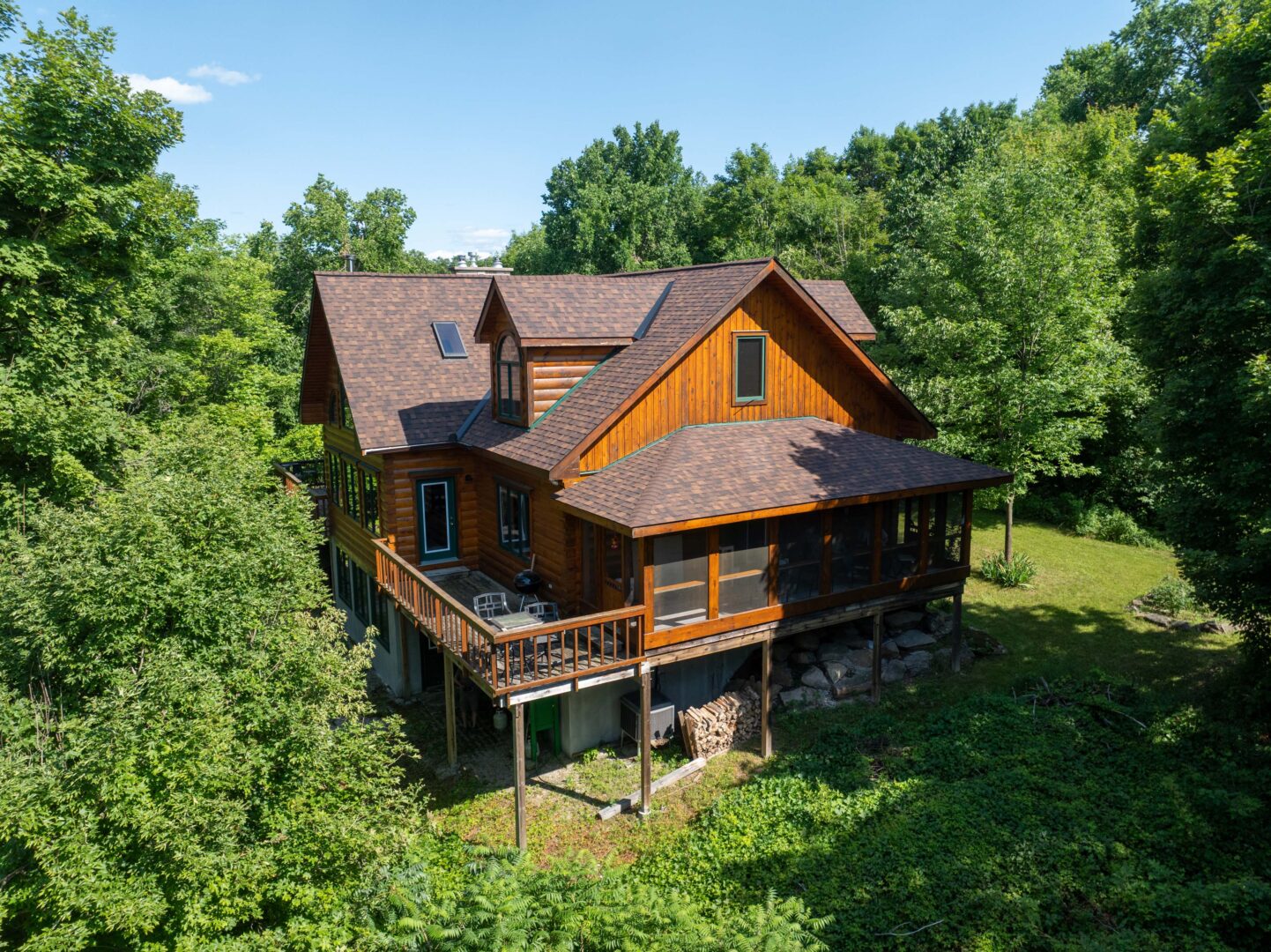 $1.39 million for a classic log cottage with cathedral windows near Westport