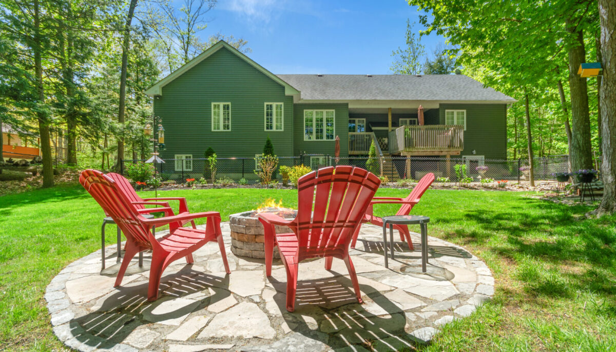Listing of the Week: This $989K Trent Lakes property is a 15-acre retreat with a historic log cabin, guest cabins, and yurt