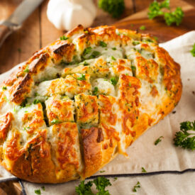 This baked ham, cheese, and veggie pull-apart bread is an easy way to feed a morning crowd