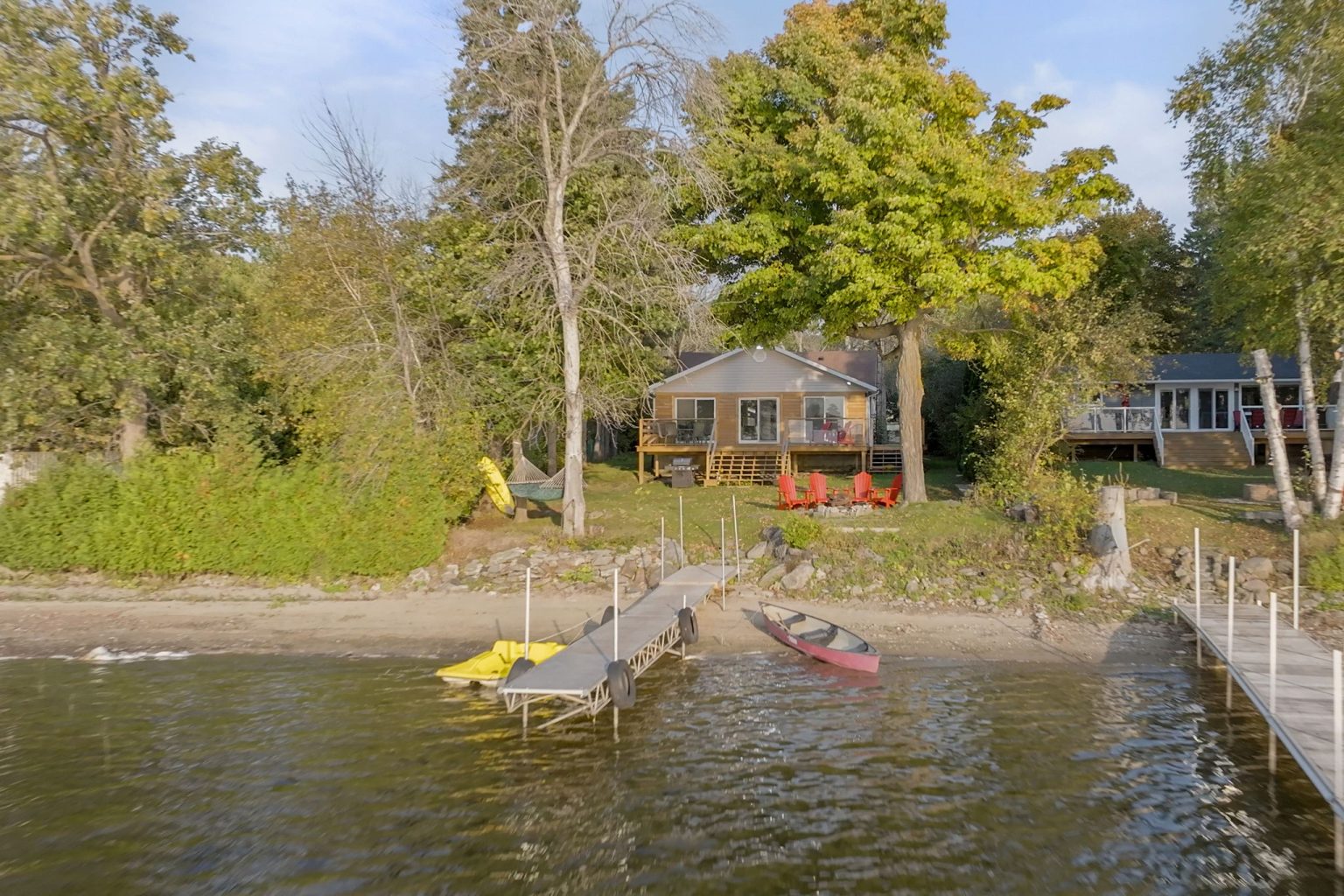 $799K for a renovated Kawartha Lakes cottage with a wraparound deck