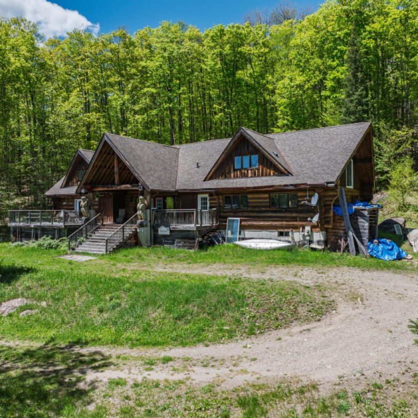 $649K for a Haliburton log cabin sitting on 51 acres of forest and trails
