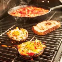 Egg-filled mushrooms and smoked trout on the grill? This recipe is a delicious way to start your day