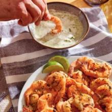 These grilled peel-and-eat shrimp with green goddess dip are guaranteed to disappear quickly